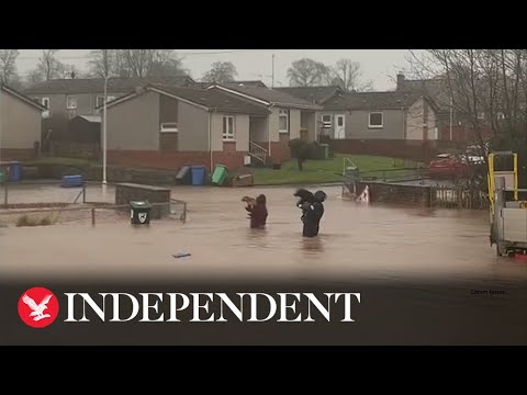 Dogs carried to safety as Storm Gerrit forces residents to evacuate Scottish town