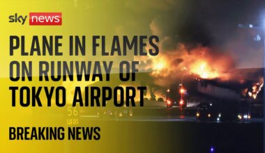 Watch live: Emergency crews respond to plane on fire on runway at Haneda airport in Tokyo