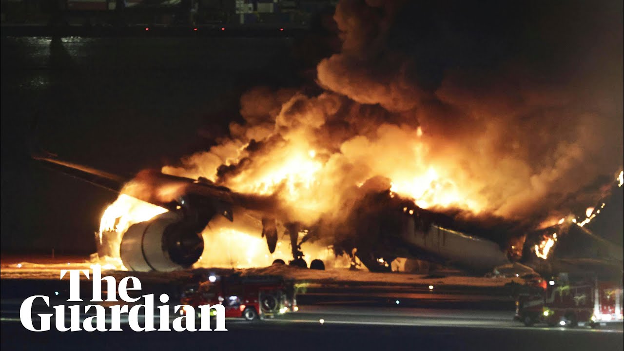 Japan: plane engulfed in flames after colliding with coastguard aircraft