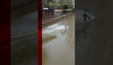 This man made the most of the flood by wakeboarding through this UK street. #Shorts #Floods #BBCNews