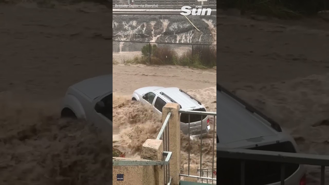 RAGING floodwaters sweep cars away in San Diego during record-breaking rainstorm #shorts