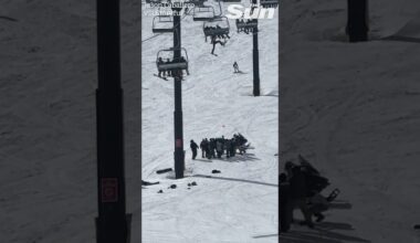 Horror moment teen snowboarder falls from chairlift