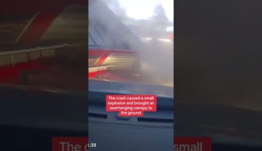 Moment truck crashes into petrol station