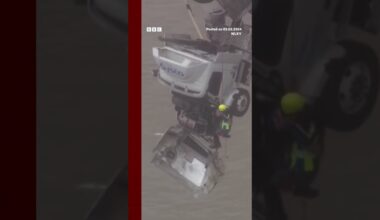 Woman rescued from truck dangling off bridge in Kentucky. #Shorts #Rescue #BBCNews