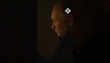 Vladimir Putin lights candle in memory of concert hall attack victims