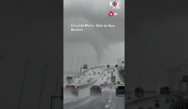 Large waterspout looms over Lisbon bridge #shorts #weather #storm