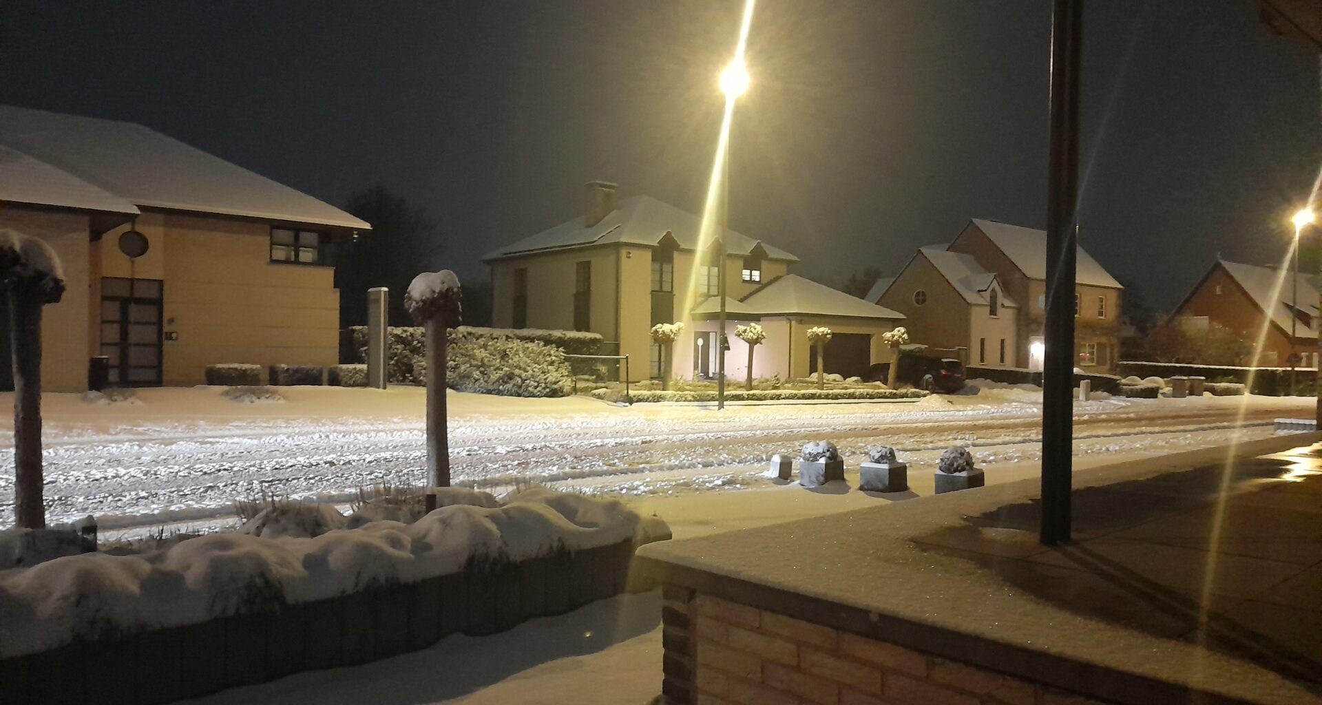 A modern suburban street in Limburg, Belgium this last winter - on the rare occassion that it snows here.