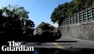 Taiwan earthquake sends boulder crashing into car