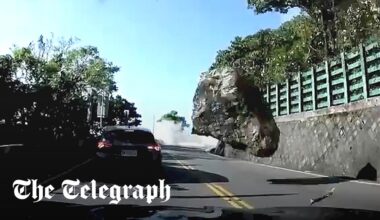 Moment boulder strikes car during Taiwan earthquake