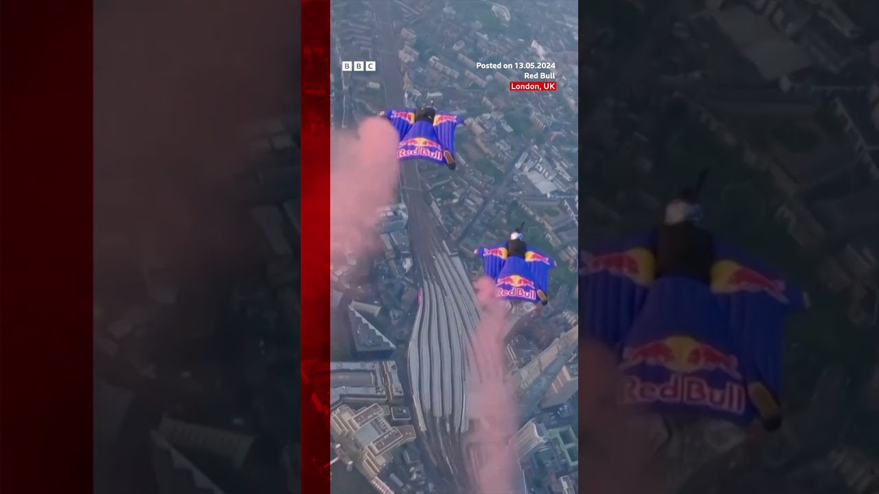 Skydivers complete wingsuit flight through London's Tower Bridge in world first. #Skydiving #BBCNews