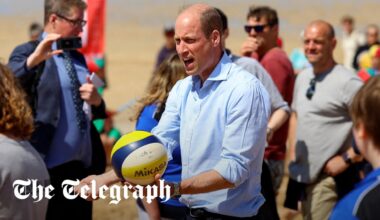 Prince William plays volleyball during Cornish beach visit