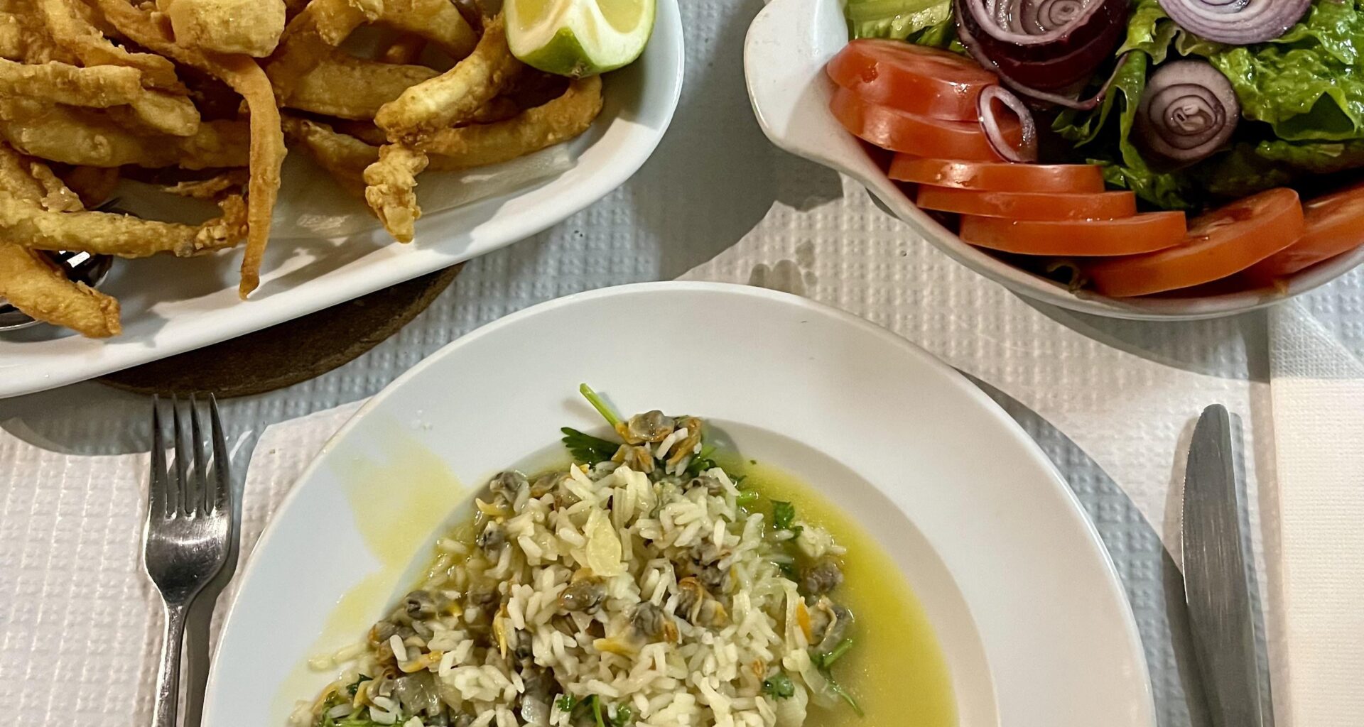 Fried cuttlefish with cockle rice and salad (Vagueira, Aveiro, Portugal)