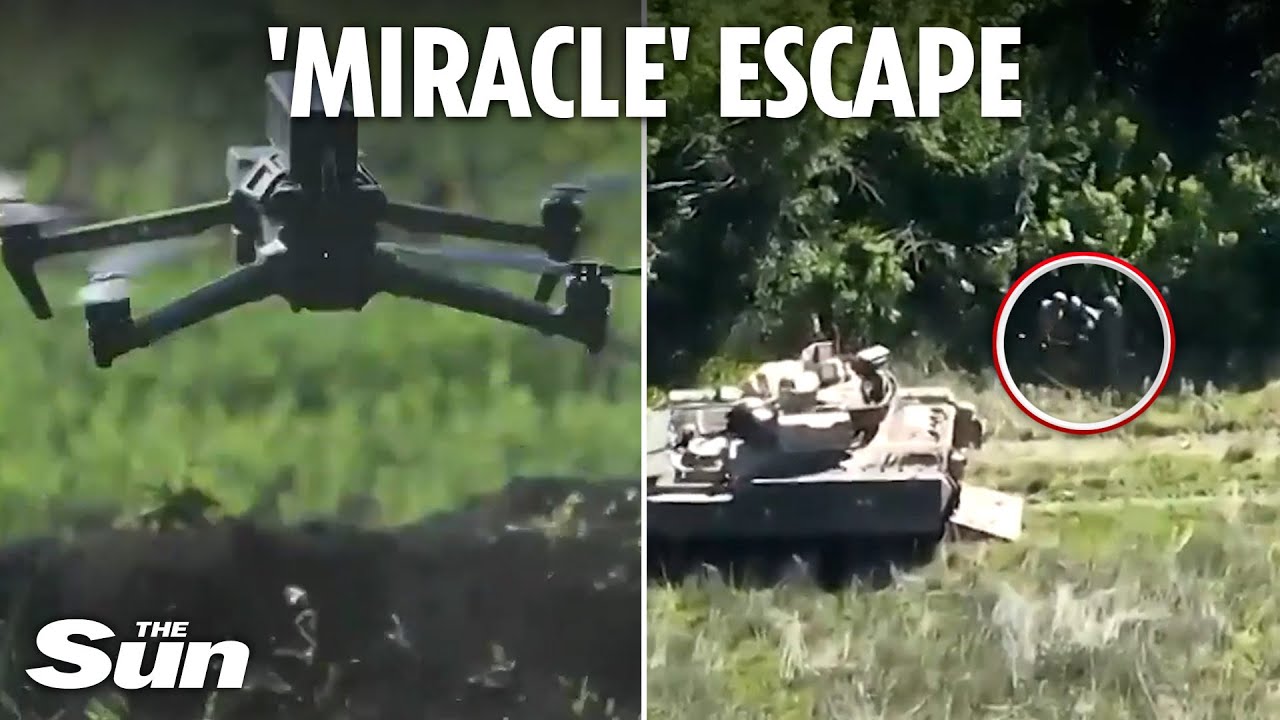 Dramatic moment wounded Ukrainian soldier surrounded by Russians is rescued by drone and tank