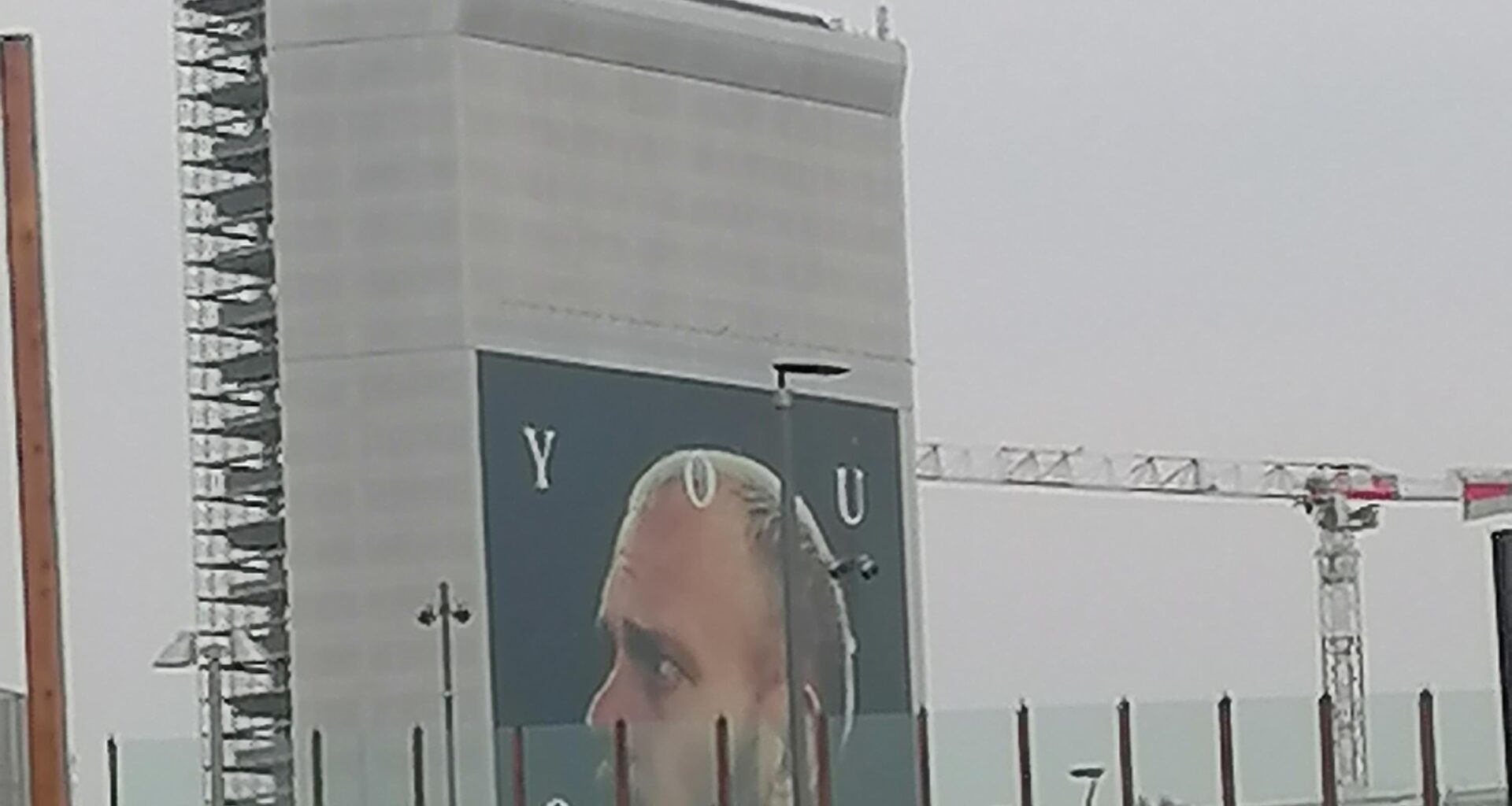 Giant Dimarco on a skyscraper under construction in Milano