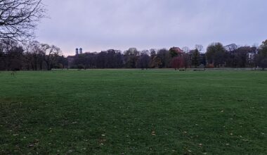 Munich, Germany. English Garden and St. Peter´s Cathedral in background . ( OC )