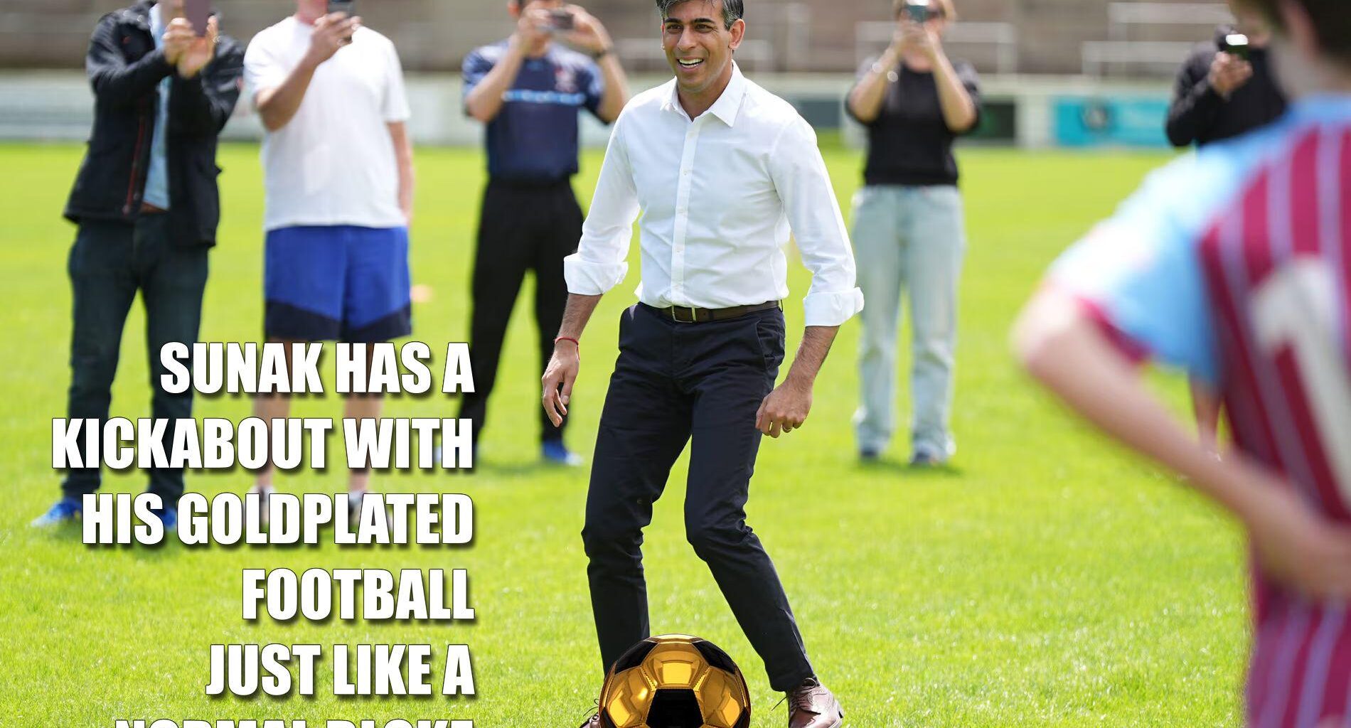 Little Rishi with his normal sized gold football