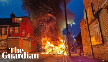 Police car turned over and vehicles set alight in Leeds unrest