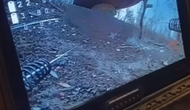 Russian coming out of a sewer gets eliminated from a Ukrainian drone laying on the ground