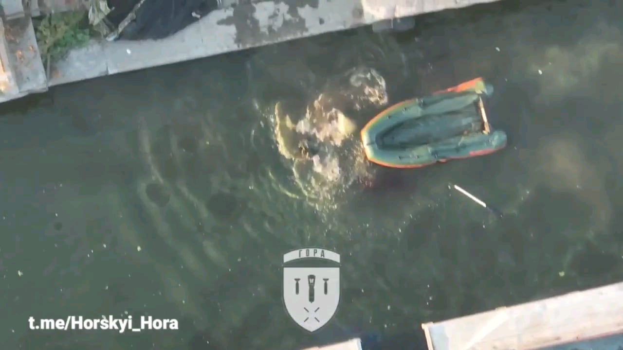 NSFW: Drone Pilot of the "Horskyi Hora" unit lands a direct hit with dropped ammunition on a Russian rubber dinghy, killing all three occupants