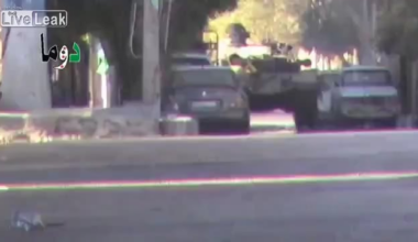 Syrian rebel soldier does an insane Hit and Run shot on a T-72 SAA tank ,location: douma, syria .early 2014