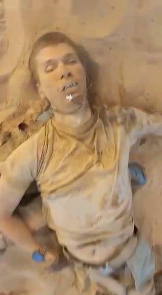 Reportedly this is this a corpse of a Famous Russan blogger/propagandist that was killed an ambush in mali