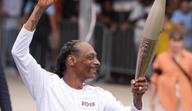 Snoop Dogg carrying Olympic torch