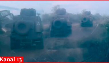 Footage of Ukrainian soldiers advancing with equipment and breaking through defense line in Kursk