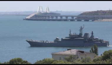 Ukraine strikes ferry crossing in occupied Crimea and vessel in Russia