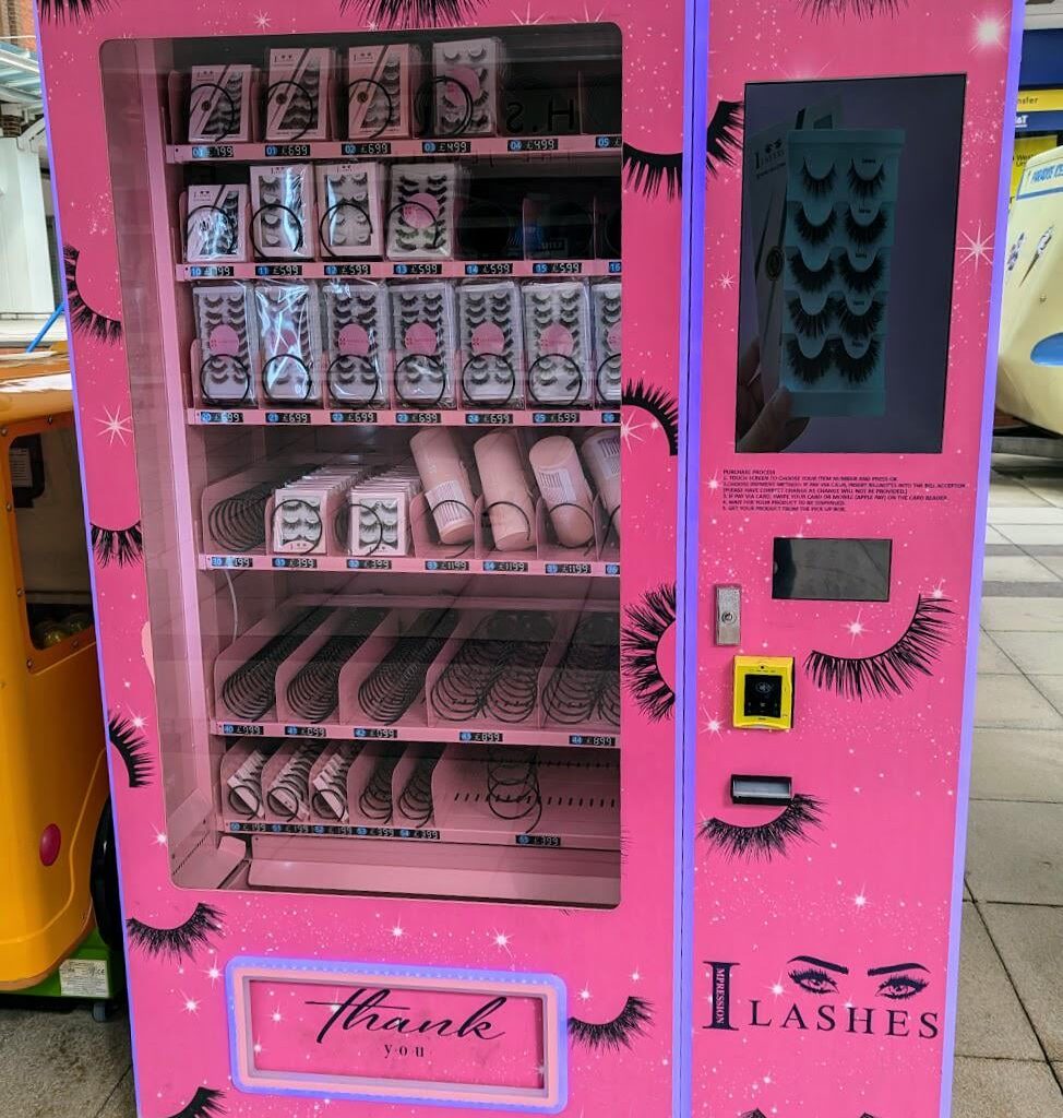 Just what we all need. A fake eyelash vending machine!