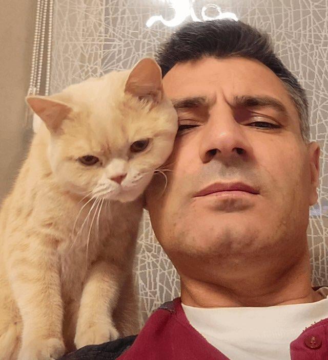 Olympic shooter and silver medalist "Yusuf Dikeç" with his cat😻