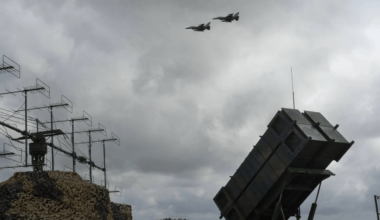 Ukranian F-16 flying over patriot launcher