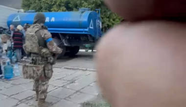 A Ukrainian soldier gives his rations to a young Russian child in the Kursk region - August 2024