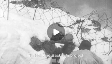 An Austro-Hungarian soldier in his snowy trench firing at an enemy position in the Italian alps, 1917.