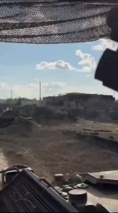 Ukrainian troops cross the Russian border driving past empty Russian fortifications on their M1126 Stryker