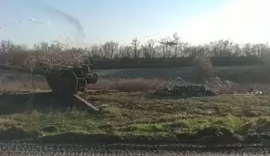 Ukrainian Mi-24s fire unguided missiles at Russian positions, which are also simultaneously fired on by artillery.