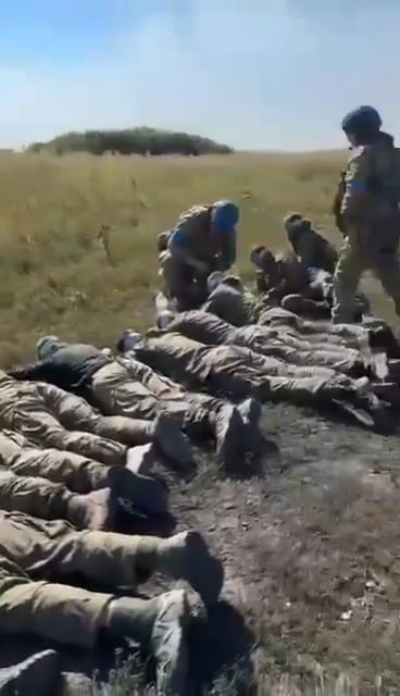 Another video of the surrender of 100 Russian soldiers in Kursk (August 14th, 2024)