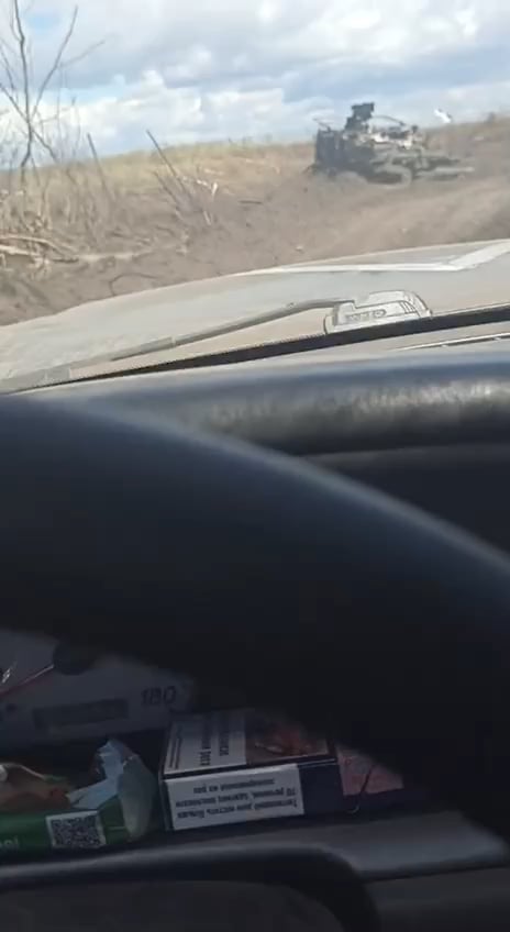 Ukrainian soldiers, while crossing the Russian border, are seen laughing and joking about how the Ukrainian Army is giving anyone the opportunity to "visit abroad." The video also shows a destroyed American M1132 ESV engineering vehicle, mine warning flags, and Russian-deployed dragon's teeth.