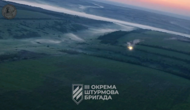 T-72 tank crew firing at Russian positions from a distance with the 125mm cannon to support Ukrainian infantry and then retreating while activating a smoke screen, Kharkiv region. 3rd Assault Brigade. Published on August 5, 2024.