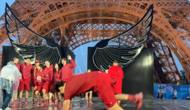 Breakdancing gold medalist Phil Wizard breaking under the rain during the opening ceremony