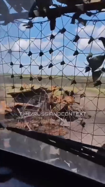 A Russian serviceman filmed the moment a Ukrainian FPV drone attacked his Bukhanka car with an electronic warfare system