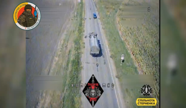 Ukrainian kamikaze drone destroys a Russian KamAZ-4350 when a soldier peeks out the hatch. Kursk Oblast. August 2024