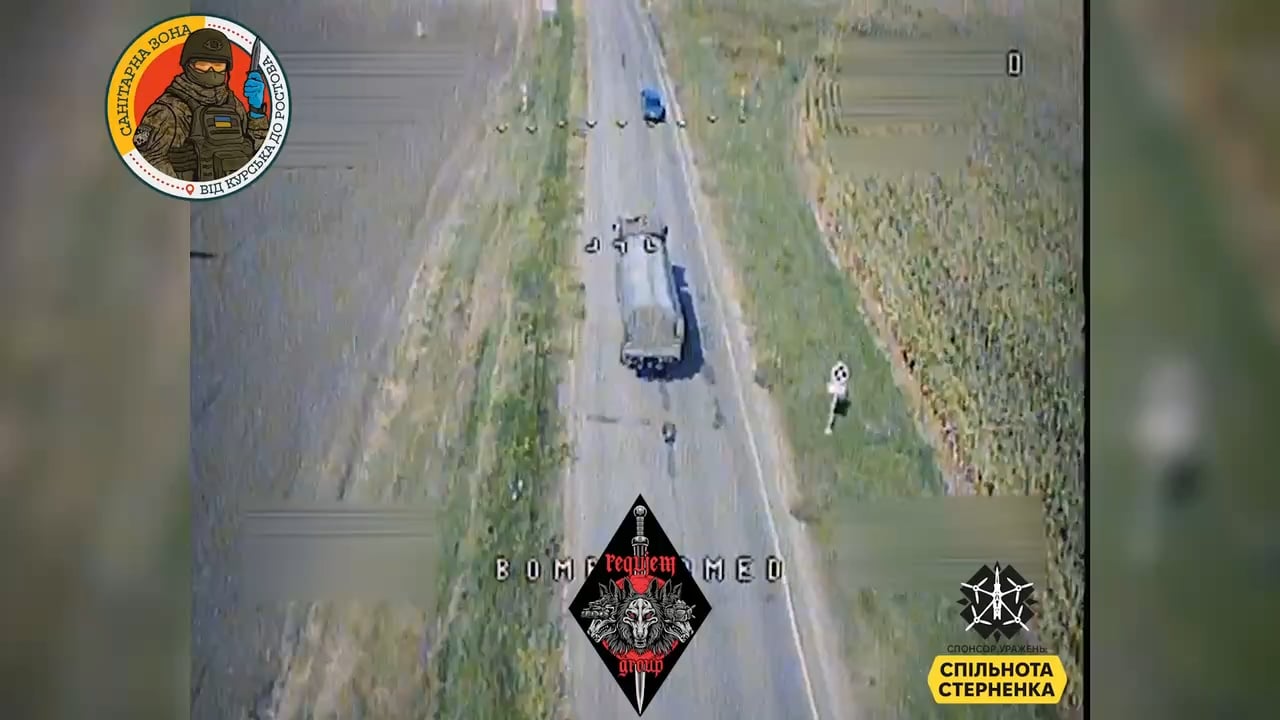 Ukrainian kamikaze drone destroys a Russian KamAZ-4350 when a soldier peeks out the hatch. Kursk Oblast. August 2024