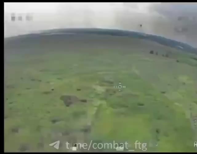 Ukrainian FPV drone takes down a Russian Mavic drone about to perform a drone drop