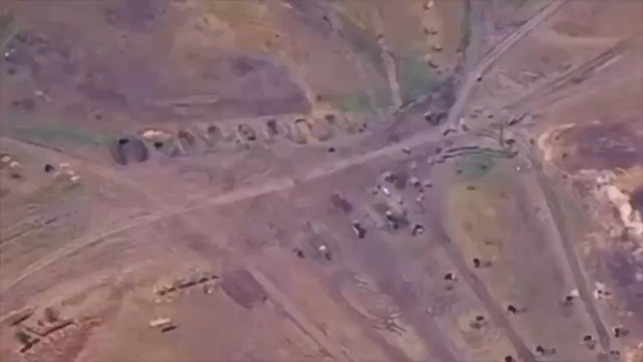 Drone footage of a Ukrainian M142 HIMARS strike on a Russian training ground using M30A1 rockets. Zaporizhzhia Oblast.