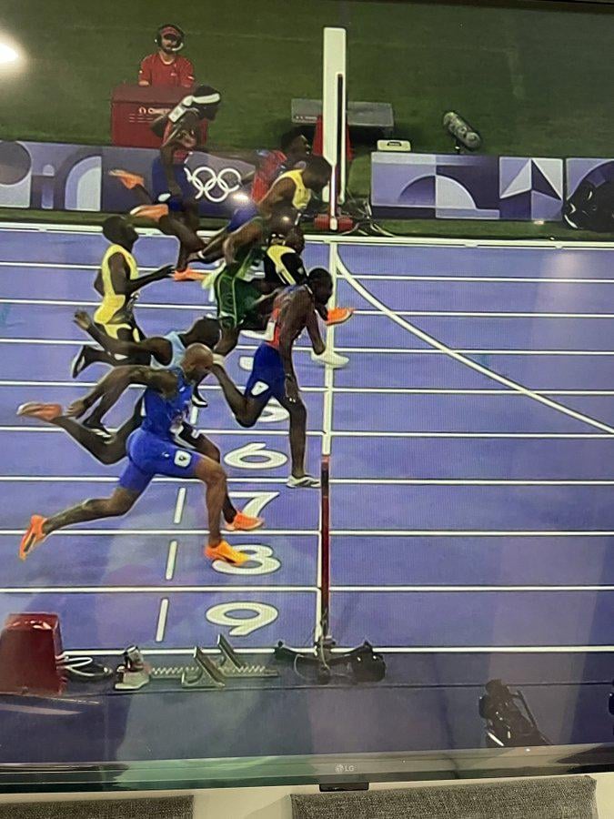 Noah Lyles wins by millimetres