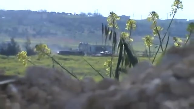 Camera set up to film an ambush on an SAA tank is knocked over by return fire - Hish, Idlib - 4/6/2013