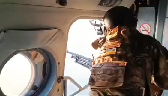 Ukrainian helicopter door gunner shoots down Shahed drone.