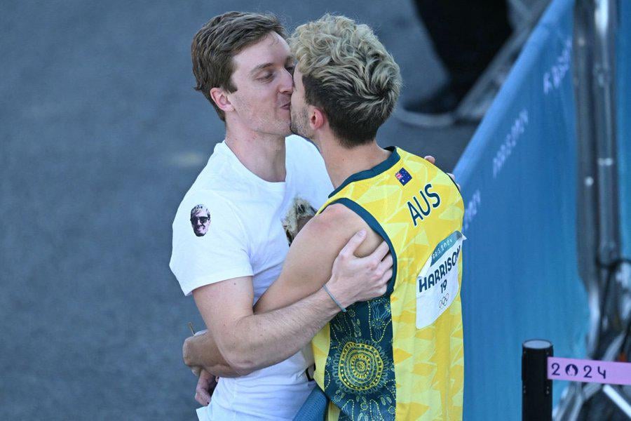 Campbell Harrison kissing his boyfriend after failing to qualify for the climbing final