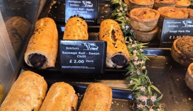 Lunch Bargains from the butcher local to my office. Pen for scale of the hot roast pork and crackling, which is £3.50. Can you beat that? The sausage rolls are a meal in themselves!