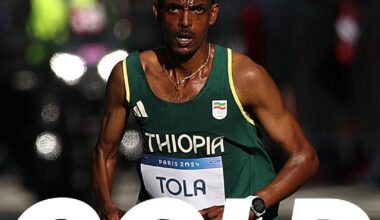 Tamirat Tola wins the Men's Marathon in a time of 2:06:26 - an Olympic record